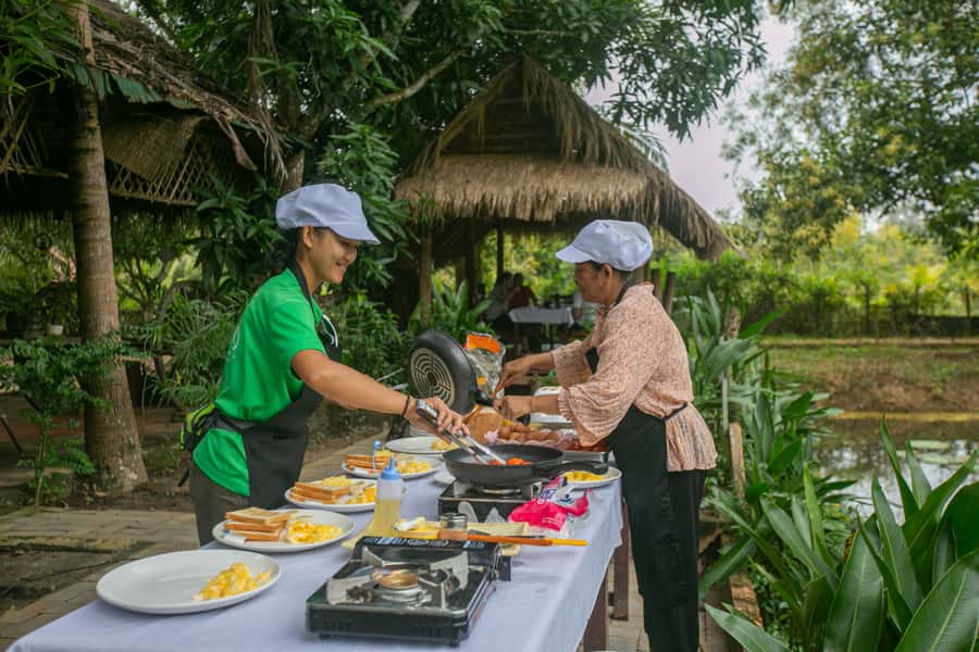 Angkor Wat: Guided Sunrise Bike Tour w/ Breakfast and Lunch - What You Learn Beyond the Postcard Views