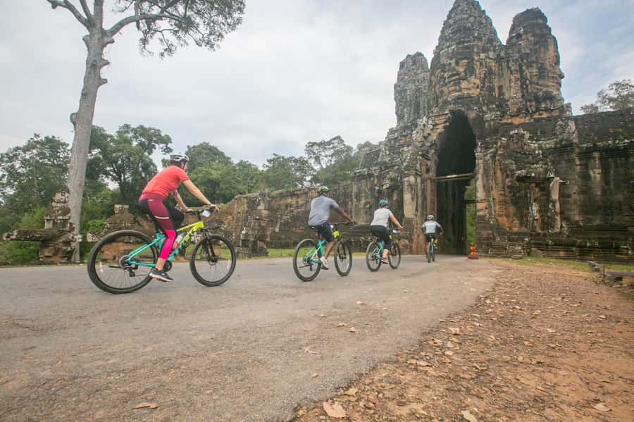 Angkor Wat: Guided Sunrise Bike Tour w/ Breakfast and Lunch - Bayon Temple and Ta Prohm: Two Different Kinds of Iconic