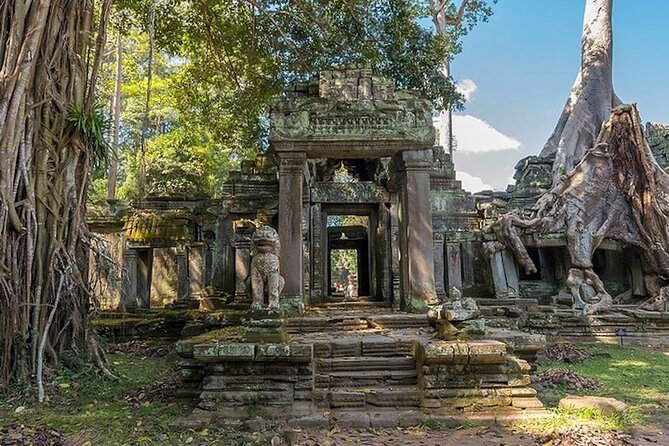 Angkor Wat Sunrise: Exclusive Private Tour! - Angkor Thom and Bayon: city walls, symbolic entrances, and a face everywhere