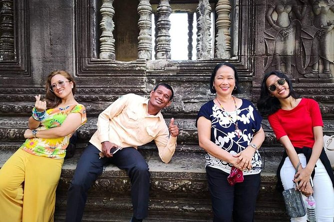 Angkor Wat Sunrise tour with Small - Group and Guide tours - Ta Prohm: Tomb Raider vibes, but bring your patience for jungle light