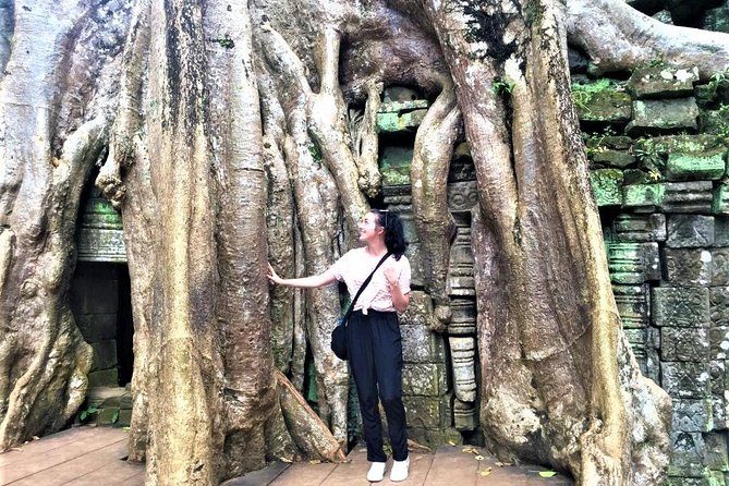 Best Temples Day Tour in Siem Reap with Sunset - Angkor Thom South Gate and Bayon faces: big drama, fast pace