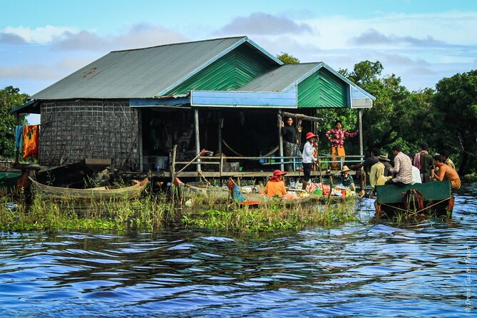 discover floating villages and tonle sap lake by boat - Lotus Fields Stop: A Calm Contrast Before the Crocodile and Fish Farms