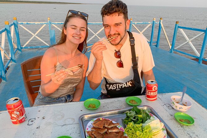 Floating Village Sunset Boat Vespa Tour / Tuk Tuk Available - Tonle Sap sunset from the upper deck with cold drinks