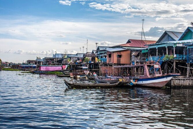 Kompong Phluk Village Tonle Sap Lake Half-Day Tour From Siem Reap - Market stops, fruit snacks, and the question of shopping pressure