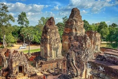 Siem Reap 2-Day Private Angkor Wat Tour with Sunrise - Day 1 through Angkor Thom: gates, faces, and temple carvings