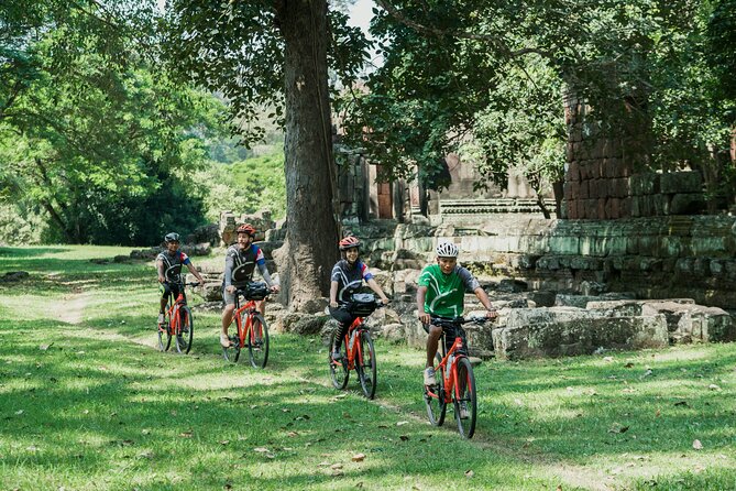 Siem Reap: Angkor Wat Sunrise Bike Tour & Jungle Breakfast - Ta Prohm: the roots, the ruins, and the photo factor
