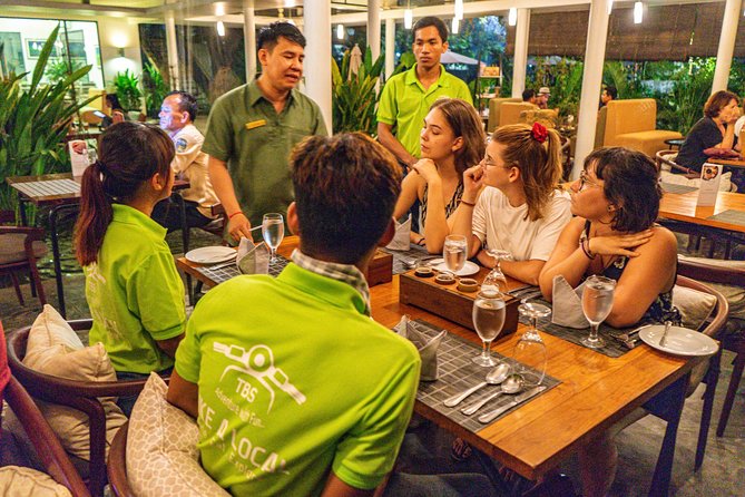 Siem Reap Evening Foodie Vespa Tour / Tuk Tuk Available - Stop 2: Made in Cambodia Market for silk and snack-friendly browsing