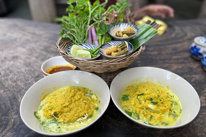 Siem Reap Evening Foodie Vespa Tour / Tuk Tuk Available - Stop 3: Fruits, spring rolls, tofu, BBQ snails, and Phum Num noodles