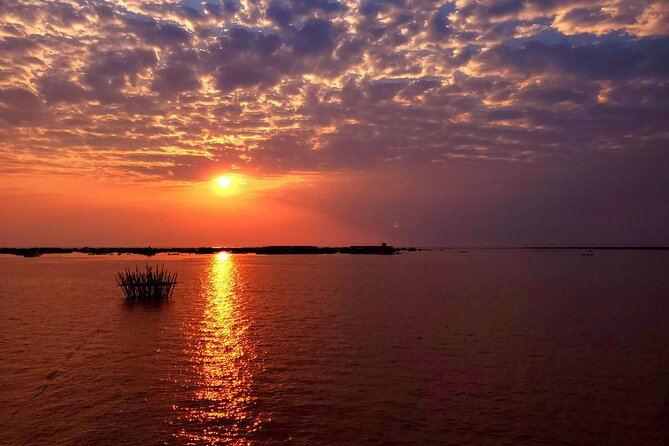 Sunset Dinner and drinks includes a Floating Village cruise tour. - Value and price: what you get for $49