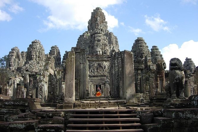 The Angkor Temples from Sunrise by Tuk Tuk - Angkor Thom and the Bayon: the faces and the geometry