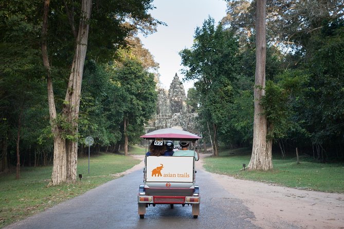 The Angkor Temples from Sunrise by Tuk Tuk - Ta Prohm: the tree roots moment that everyone remembers