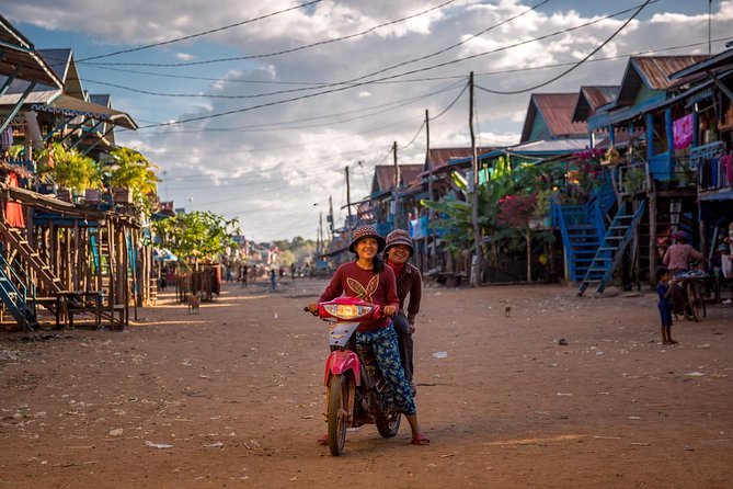 Tonle Sap Lake and Kampong Phluk Village Private Half Day Tour - Walking through stilted life: what Kampong Phluk looks like on different water levels